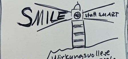 smile statt smart ziele wirkungsvoller formulieren leuchtturm mit der schrift smile statt smart